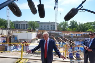 US President Donald Trump giving the media a tour of the construction site. Photo: AP