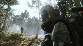 Arc Raiders: Key art of a raider looking over their shoulder in a forest to look at another raider aiming at them in the distance.