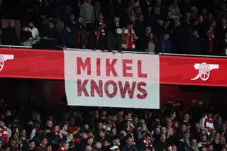 A banner is unveiled by Arsenal fans during Monday’s 1-0 win over Burnley.