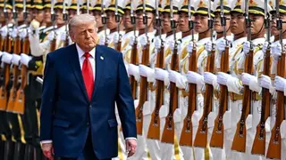 Getty Images US President Donald Trump reviews an honor guard with Chinese President Xi Jinping during a welcome ceremony at the Great Hall of the People on May 14, 2026 in Beijing,