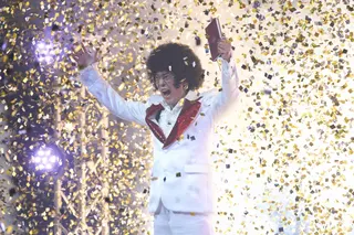 Afro-wigged host Momotaro Kabayama (Toshiaki Karasawa) presides over the eponymous game show in Yukihiko Tsutsumi’s “Mystery Arena.”