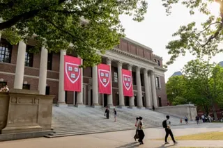 people walk on a university campus
