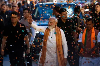 India’s Prime Minister Narendra Modi greets his supporters in New Delhi after the BJP won the Assam state assembly election on May 4. Photo: Reuters