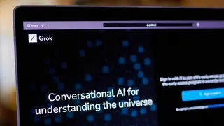 The Grok website on a laptop computer arranged in New York, US, on Wednesday, Nov. 8, 2023. Elon Musk revealed his own artificial intelligence bot, dubbed Grok, claiming the prototype is already superior to ChatGPT 3.5 across several benchmarks.