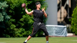 Cincinnati Bengals quarterback Joe Burrow throwing a football during practice