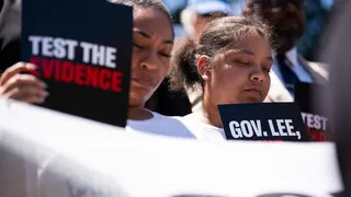 Tori Carruthers and Latobiya Carruthers praying with other protesters at Tennessee Capitol