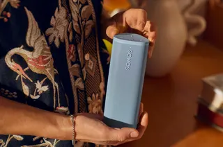 A marketing image of a blue Sonos Roam 2 speaker.