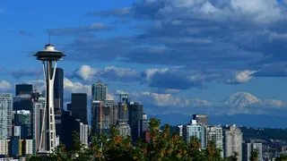 Seattle Space Needle and downtown skyline with Mount Rainier in the background