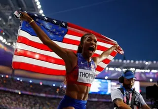 Gabby Thomas roars with delight after winning 200m gold at the Paris Olympics