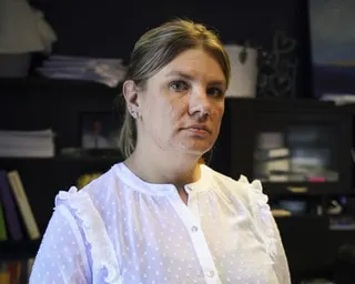 a woman looks ahead