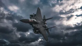 Jet fighters flying above clouds in formation.