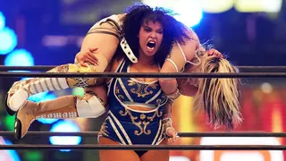 Willow Nightingale and Momo Watanabe wrestling in a ring at Tokyo Dome