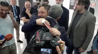 Reuters Italian lawmaker Dario Carotenuto is embraced by a relative