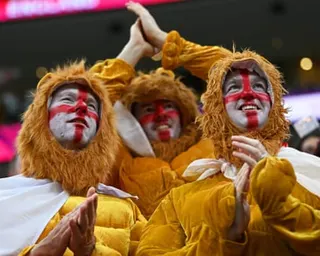 England fans dressed as lions during the last World Cup finals in Qatar