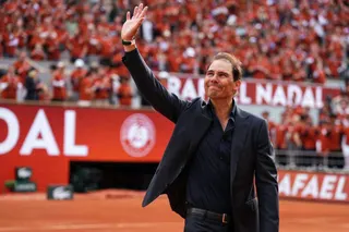 Former Spanish player Rafael Nadal waves to the crowd during a ceremony honouring his career during the French Open tennis tournament on Court Philippe-Chatrier at the Roland-Garros Complex in Paris May 25, 2025. — AFP pic