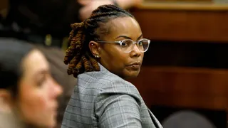 Ebony Parker looking back in a courtroom during Abby Zwerner's lawsuit in Newport News, Va.