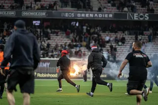Nice supporters invade the pitch at the end of their last home game of the season, on May 17, 2026.