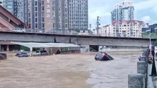 Torrential rain and floods kill at least 25 people in southern and central China – video report