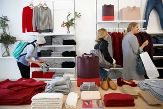 people shop in a clothing store