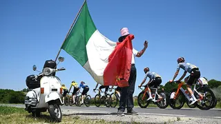 A fan by the road in Giro d'Italia's stage 13
