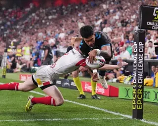 Donovan Taofifénua of Montpellier scores his team's fifth try while under pressure from Ulster’s Nathan Doak.