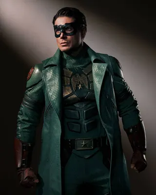 Jensen Ackles wears a green leather jacket and mask as Soldier Boy in Vought Rising