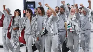 Getty Images Some of the flotilla activists arriving in Rome on Thursday