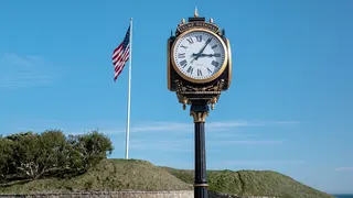 Clock and U.S. flag