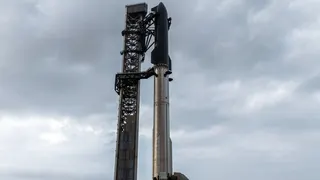 SpaceX Starship Flight 12 stands atop launch pad before May 2026 test flight under cloudy skies