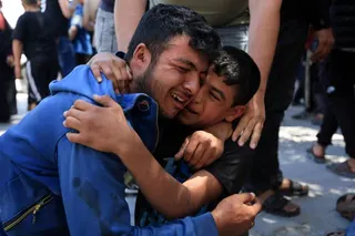 Mourners react during the funeral of policemen killed in an Israeli strike on a position, at Al-Shifa Hospital in Gaza City, May 23, 2026. REUTERS/Dawoud Abu Alkas TPX IMAGES OF THE DAY