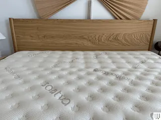 Image may contain: Furniture, Indoors, Interior Design, Bed, and Mattress