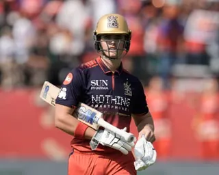 Jacob Bethell in Royal Challengers Bengaluru action