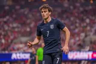 Gio Reyna looks on during a US national team match.