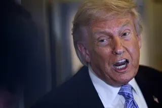 US President Donald Trump speaks to reporters aboard Air Force One on May 15 on the way back from Beijing. Photo: Getty Images via AFP