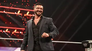 Ethan Page entering the wrestling ring at Thompson-Boling Arena in Knoxville, Tennessee