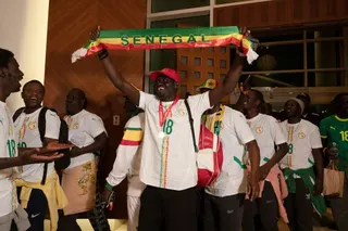Senegalese supporters who were granted a royal pardon in Morocco arrive at Blaise Diagne airport in Ndiass, Senegal