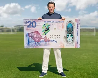 Scott McTominay with the Bank of Scotland limited-edition £20 banknote featuring an image inspired by his overhead kick for Scotland against Denmark.