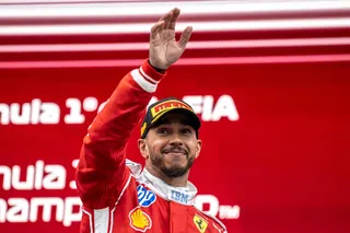 Ferrari’s British driver Lewis Hamilton waves from the podium as he celebrates his second place at the conclusion of the 2026 Formula 1 Grand Prix du Canada at Circuit Gilles-Villeneuve in Montreal, Canada, on May 24, 2026. — AFP pic