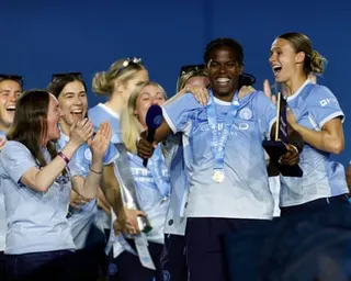 Manchester City's Khadija Shaw celebrates with teammates at Co-op Live after winning the player of the season award.