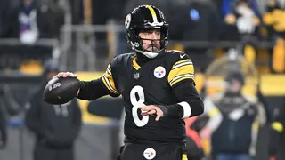 Pittsburgh Steelers quarterback Aaron Rodgers drops back to pass at Acrisure Stadium