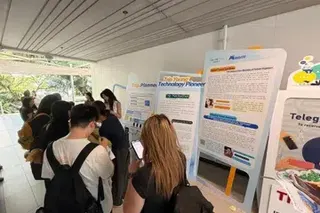 A pop-up career fair by Chinese online travel giant Trip.com on the NTU campus in Boon Lay on April 16, where roles for AI engineers and data analysts were highlighted.