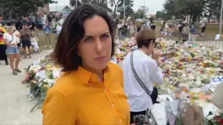 BBC News Australia Correspondent Katy Watson stands by floral tributes to victims of the Bondi shooting.