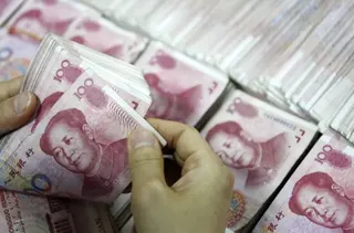 目前全球原油贸易中人民币占比估计仍低于5%。（法新社档案照）