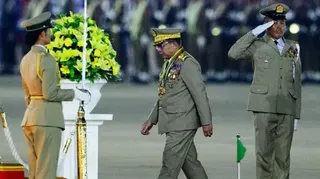 Military Chief Min Aung Hlaing arrives to deliver a speech during a ceremony to mark Myanmar's Armed Forces Day in Naypyidaw on March 27, 2026