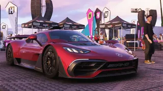 Forza Horizon 6 Stunt Party: A red Mercedes AMG One parked outside the Horizon Festival.