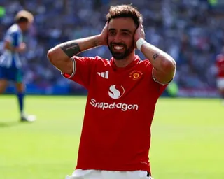 Bruno Fernandes celebrates after scoring for Manchester United at Brighton