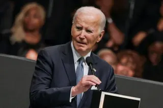 a man speaks into a microphone