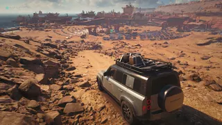 Driving towards a desert pirate stronghold in 007: First Light.