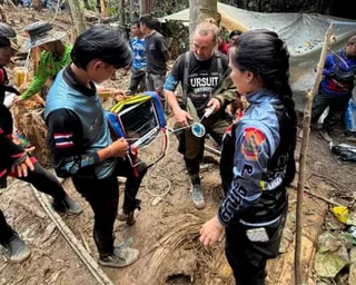 Members of a rescue team work to save seven people trapped in a cave, at a location given as Xaisomboun Province, Laos.