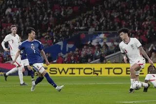 Japan’s Kaoru Mitoma (front left) scores during an international friendly against England at Wembley Stadium in March. Photo: Kyodo